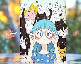 May include: A tablet case with an anime-style illustration of a girl with blue hair and glasses, surrounded by cartoon cats in different colours. The case has a light blue background with stars and the text "Just kin".