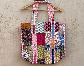 Bolso de mano de patchwork hecho a mano, bolso de hombro de algodón multicolor para uso diario y compras.