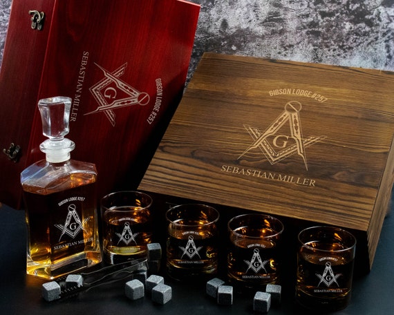 A niche Freemason-engraved decanter set in a wooden gift box — specific enough to be a standout 'they'll know it's for ME' gift with 232 favorites backing it.
