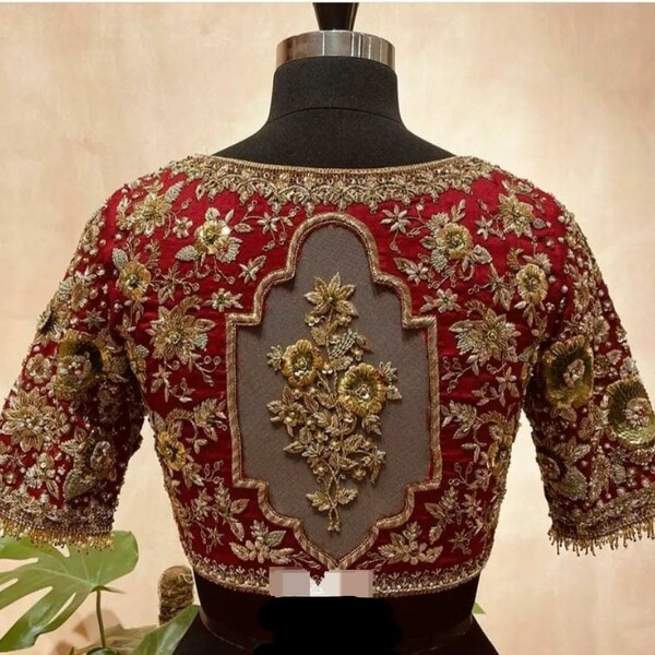 Maroon color Semi-Silk Saree With Maggam Work Blouse