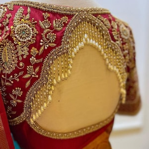 Red , wine red Gold bridal zardozi blouse elephant design