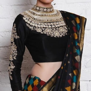 Aari work | maggam work | maroon saree blouse | embroidery blouse . Get one blouse free with this blouse.