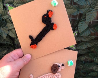 Dachshund chasing a ball crochet card