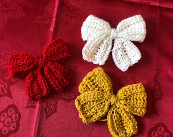 Hair bows large crocheted in a variety of colours