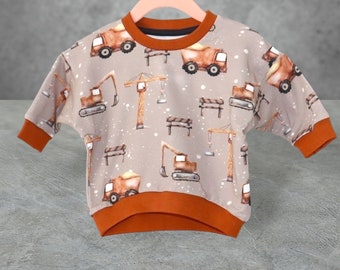 Lüddjen sweater / pullover oversized beige with construction site vehicles for babies and toddlers