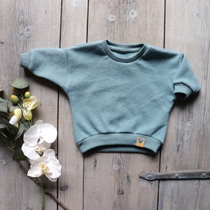 Lüddjen Sweater / Pullover aus Waffelstrick für Babies und Kleinkinder Bild 1