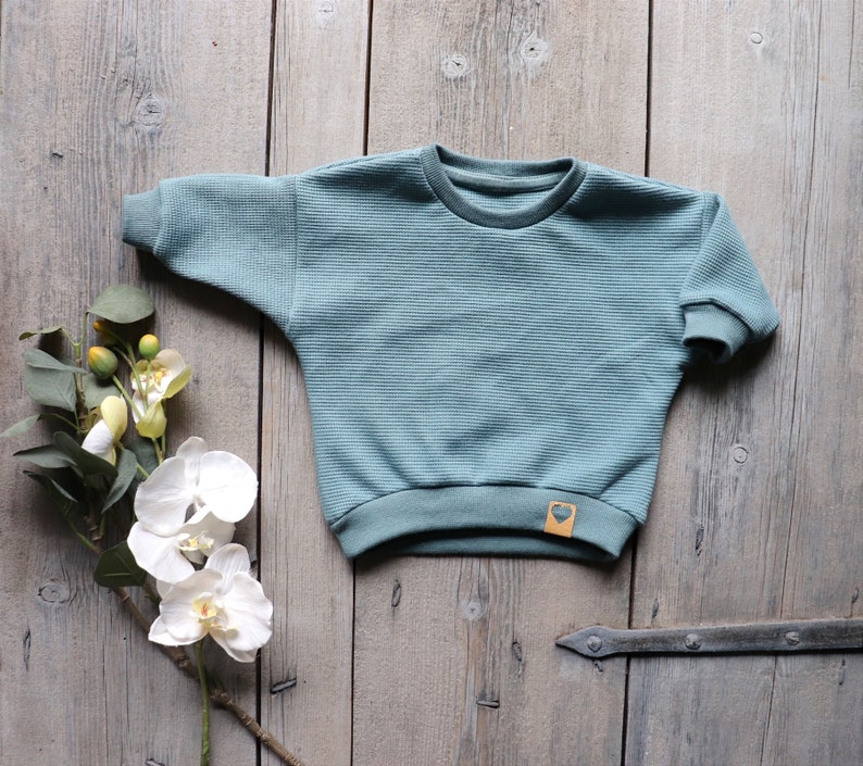 Lüddjen Sweater / Pullover aus Waffelstrick für Babies und Kleinkinder Bild 1