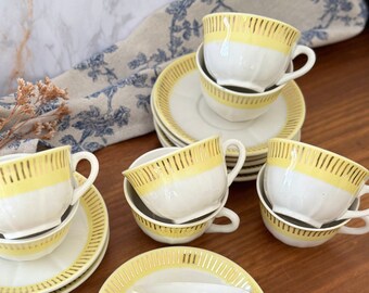 Set of Badonviller yellow and gold coffee cups