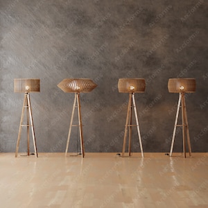 May include: Four wooden tripod floor lamps with different shaped shades. The shades are made of thin strips of wood and have a natural wood finish. The lamps are all turned on and casting a warm glow.