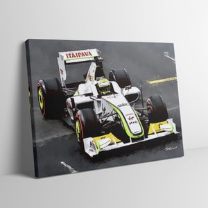 May include: A white and green Formula One race car with the word "ITAIPAVA" on the top of the car. The car is on a gray asphalt track.