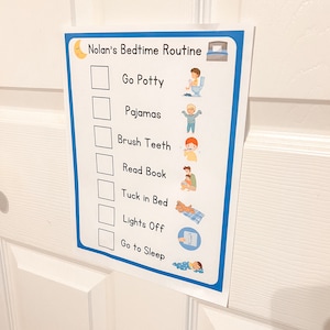 May include: A white printable bedtime routine chart with blue borders and illustrations. The chart lists the following steps: Go Potty, Pajamas, Brush Teeth, Read Book, Tuck in Bed, Lights Off, Go to Sleep.