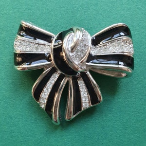 Enamel bow brooch - .de