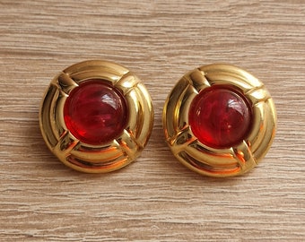 Earrings with ruby red stone, branded Beauty Brass Made in Italy.