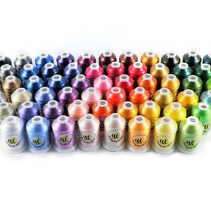 May include: A collection of 50 spools of embroidery thread in a rainbow of colours. The spools are arranged in a triangular shape and feature a bee logo.
