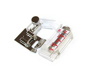 May include: A clear plastic sewing machine foot with a metal adjustment knob and a ruler marked in millimeters. The ruler is labeled "5 10 15 20 W".