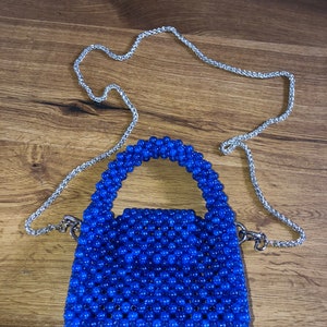 Zerbrochene Glastasche, handgemachte Perlentasche