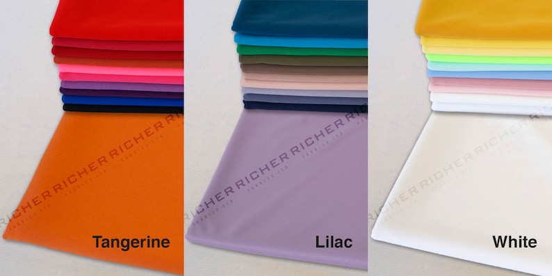 May include: A stack of fabric swatches in various colors, including red, orange, pink, purple, blue, green, yellow, and white. The swatches are labeled with the colors: Tangerine, Lilac, and White.