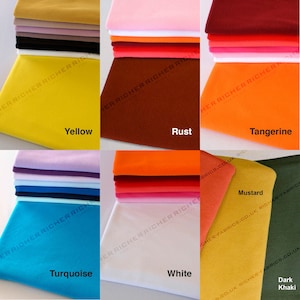 May include: A collection of 10 different colors of fabric swatches. The colors are: yellow, rust, tangerine, turquoise, white, mustard, and dark khaki. The fabric is a soft, stretchy knit.