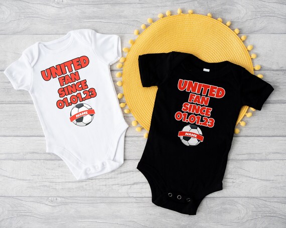 Man utd cheap baby grow girl