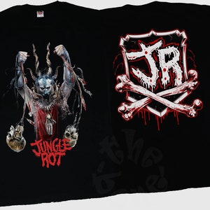 May include: Black t-shirt with a graphic of a horned figure holding two skulls and the text "Jungle Rot" on the front. The back of the shirt features a white skull and crossbones design with the letters "JR" in the center.