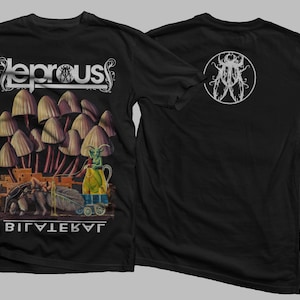 May include: Black t-shirt with a white band featuring the word "Leprous" and a small insect graphic. The front of the shirt has a colorful illustration of mushrooms, a small creature, and the text "Bilateral". The back of the shirt has a white insect graphic in a circle.