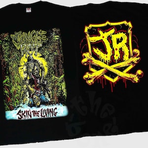 May include: Black t-shirt with a graphic print of a monster in a jungle scene with the text "Jungle Rot" and "Skin the Living". The back of the shirt has a yellow graphic of a shield with the letters "JR" and crossed bones.