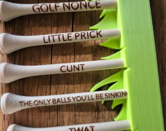 Offensive golf tees set of 10 with grassy stand