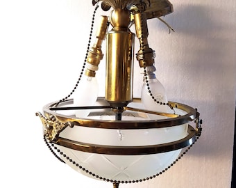Mid Century Brass and Frosted cut glass pendant light.