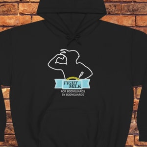 May include: Black hooded sweatshirt with a white silhouette of a person drinking from a carton with the text "Fight Milk for Bodyguards by Bodyguards".