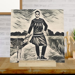 May include: A black and white illustration of a person wearing a black and white patterned shirt, black pants, and sunglasses. The person is standing next to a deer. The background is a stylized landscape.