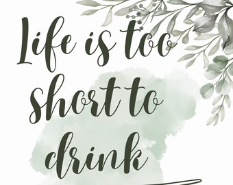 May include: A white background with a green watercolor wash and green leafy branches. The text "Life is too short to drink bad wine" is written in black cursive font. A line drawing of a hand holding a wine glass is in the bottom right corner.