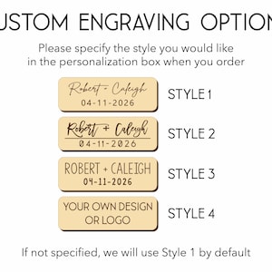 May include: A rectangular light wood plaque displaying four custom engraving options. Style 1, 2, and 3 show the names Robert + Caleigh with the date 04-11-2026 in different fonts. Style 4 reads YOUR OWN DESIGN OR LOGO. Text includes CUSTOM ENGRAVING OPTIONS.