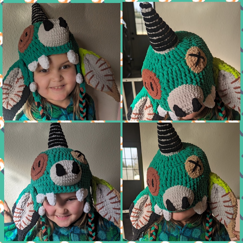 May include: Green crocheted monster hat with black and white stripes, featuring a toothy grin and large eyes. The hat is worn by a child.