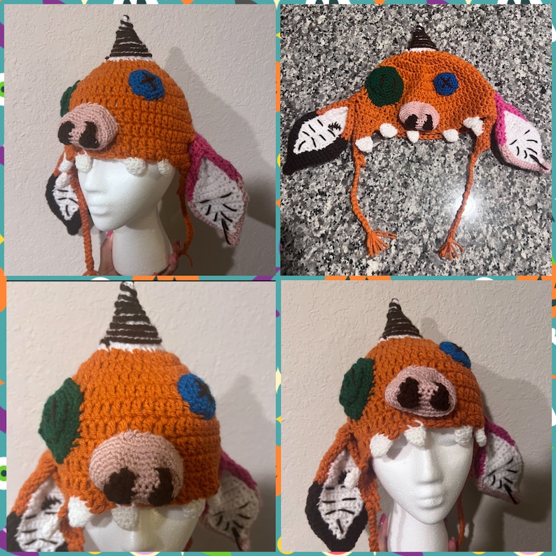 May include: A crocheted hat shaped like a monster with orange, brown, green, blue, and white yarn. The hat has a long tail and large ears.