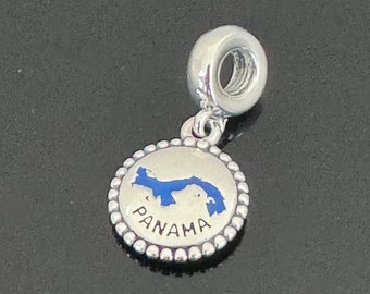 May include: Silver charm with a blue enamel map of Panama and the word "PANAMA" inscribed on the front.