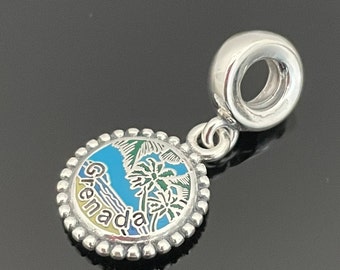 May include: Silver charm with a blue, green, and yellow enamel design of palm trees and the word "Grenada".