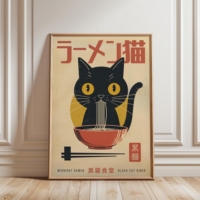 May include: A framed poster featuring a black cat eating ramen from a red bowl. The cat has yellow eyes and is set against a yellow circle. Japanese text is at the top, with English text at the bottom: "MIDNIGHT RAMEN BLACK CAT DINER."