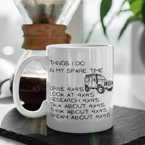 May include: White ceramic mug with a black graphic of a 4x4 vehicle and the text "Things I do in my spare time: Drive 4x4's, Look at 4x4's, Research 4x4's, Talk about 4x4's, Think about 4x4's, Dream about 4x4's".