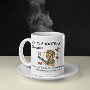 Clay Shooting Noun Mug – Funny Definition Mug for Clay Shooters – 11oz Ceramic with Cartoon Shooter & Broken Clays