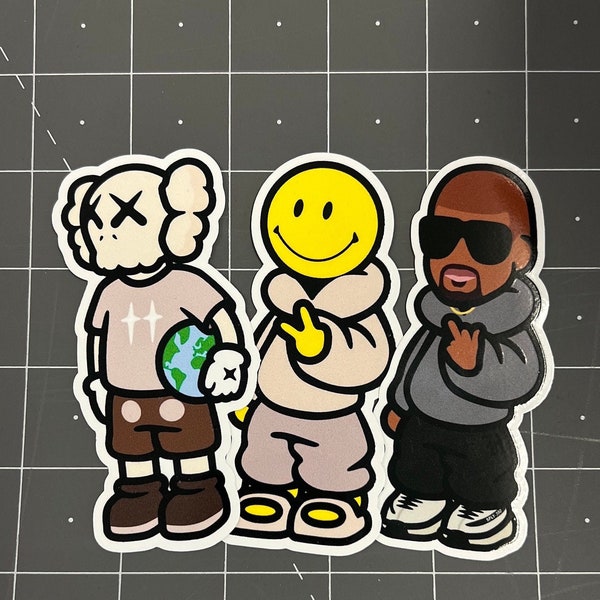 Kaws, Kanye West, & SMILEY sticker pack/decals. Streetwear Luxury Travis Scott Kid Cudi Lamar Don Toliver Lil Uzi Vert Playboy Carti Yeet