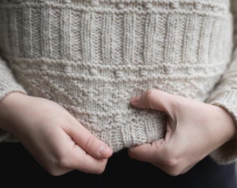 Breipatroon raglantrui, vissersbreipatroon, van boven naar beneden gestructureerd. Trui, vest en vest