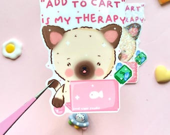 May include: A sticker featuring a cartoon dog with a laptop, surrounded by stars and hearts. The text "ADD TO CART" is above the dog, and the text "is MY THERAPY" is below the dog. The sticker is on a pink background.