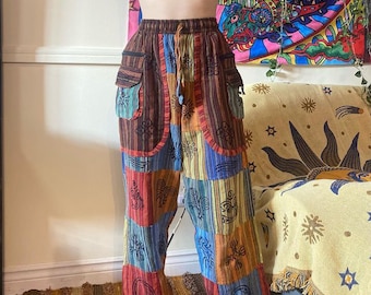 Pantalones hippies de patchwork coloridos con bolsillos y cintura elástica, cómodos pantalones de yoga, estampado bohemio para festivales, unisex.
