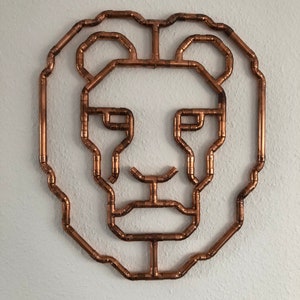Wall decoration lion made of copper pipe