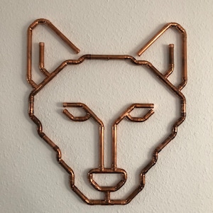 Wall decoration wolf made of copper pipe