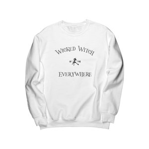 May include: White long-sleeve sweatshirt with the text "Wicked Witch of the Everywhere" printed in black.