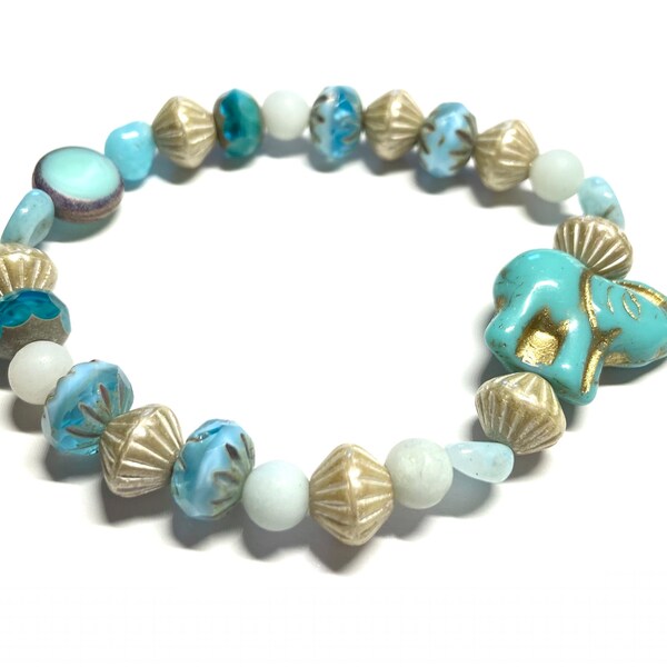 Aqua Czech glass Elephant bead bracelet adorned by antique silver washed opaque ivory beads, white accent beads & metallic wash aqua beads.