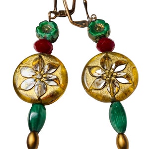 Gold transparent floral cut Czech glass bead dangle earrings adorned by emerald green & ruby red beads.