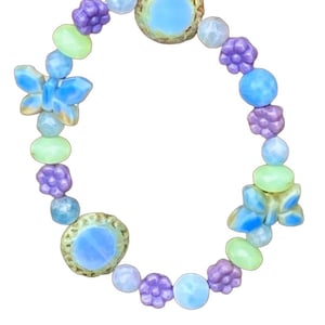 Blue Czech glass Butterfly bead bracelet adorned by cornflower blue & pastel green glass beads w/ added lavender daisy beads to 2nd bracelet