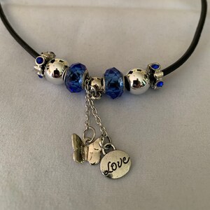 blue and silver charm necklace
